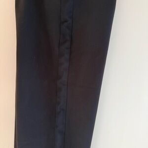 Universal Standard wide-leg black pants with black side stripe. Size M.
